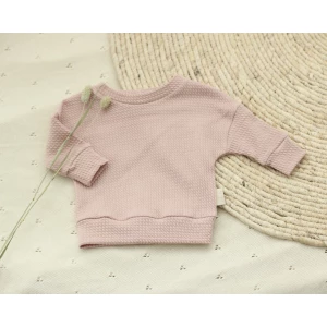 Een oversized sweater van mini cable stof in de kleur nude pink